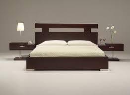 Try positioning your bed at an angle to save space in a tight room. Bedroom Furniture Modern Simple Wooden Bed Designs Pictures Novocom Top
