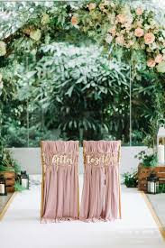 Gorgeous Blush Pink Chairs For The Bride And Groom Under A Green And Pink Wedding Arch Top Wedding Photographers Wedding Chairs Wedding