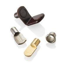 A wood wall shelf is practical by itself, but by adding pegs it serves a double purpose. Shelf Pins Nickel Brass Stainless Antique Widgetco