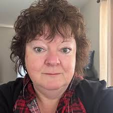 An unintentional arrival in Asheville led Abby Roach to a life as a  musician, storyteller, and activist who is known worldwide as simply "The  Spoon Lady."