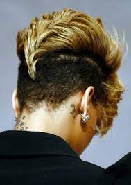 It is a short in length glossy haircut. Rihanna Short Haircut