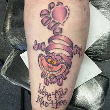 22 Awesome Cheshire Cat Tattoos Catster Cheshire Cat Tattoo Disney Tattoos Cartoon Tattoos