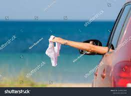 Girl Car Arrived Nudist Beach Holds Stock Photo 2039571029 | Shutterstock