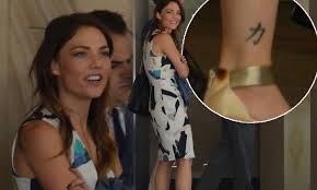 The tattoo of the number represents 3. Bachelorette Sam Frost Flashes Her Chinese Character Ankle Tattoo Daily Mail Online