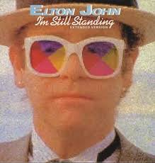 April 21st I M Still Standing Is A Song On English Pop Rock Performer Elton John S 1983 Album Too Low F Elton John Elton John Album Covers Elton John Songs