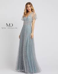A collection of classic designs curated with a youthful sophistication that both marks the moment and redefines tomorrow. Mac Duggal 79219d Signature Dresses