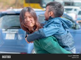 Japanese mother and son having fun together. Japanese Mother Image Photo Free Trial Bigstock