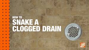 6 steps to unblocking a clogged drain using a plumbers snake. How To Unclog A Shower Drain The Home Depot