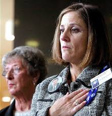 Fight the fight of the fallen, mayor tells officers' relatives