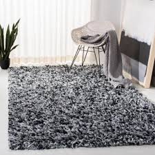Group of friends sitting on shag rug. Shag Black Area Rugs Rugs The Home Depot