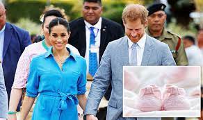 Crew sweatshirt , rolled jeans, white velcro sneakers and a green backpack. Meghan Markle Is This The Clue The Duchess And Prince Harry Are Having A Girl Express Co Uk