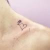 The small heart tattoos under the ears and ribs are also very good. 1