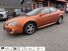 Image result for Sunburst Orange 2004 Pontiac