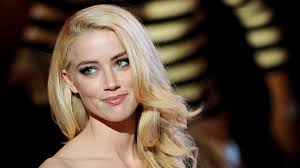 Get this bronzy smokey eye with just a hint of carbon smoke for the holiday season. Amber Heard Talks Rum Diary Johnny Depp Playboy Club And Coming Out Gay