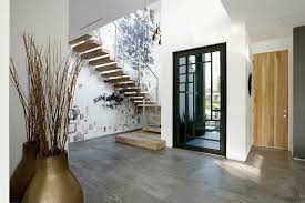 Black window frames are on the rise. Contemporary Home With Pool Has Black And White Interior