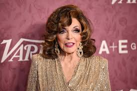 Joan Collins, 93, Throws It Back to Her ‘Dynasty’ Days in Two Daring White Dresses