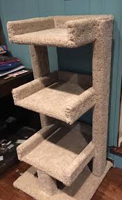 Scrape, sand, and finish the branches. Diy Cat Condo One Brown Mom