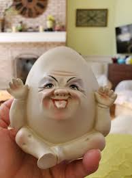 This was gifted to me over 25 years ago from a friend who bought it in  Russia. I believe it is filigree egg. I don't know what type of stone that  is