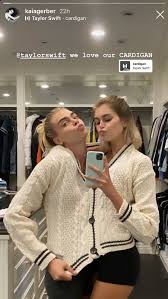 Taylor swift's cardigan drops hints about her private relationship with joe alywn. Kaia Gerber And Cara Delevingne Wear A Taylor Swift Cardigan Popsugar Fashion