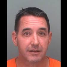 He pretended to be a cop in St. Pete. Then he was found passed out behind  the wheel, police say.