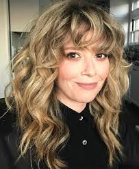 Ever wondered how you can make curly hair bangs work for you? 41 Gorgeous Wavy Hairstyles With Bangs For 2020