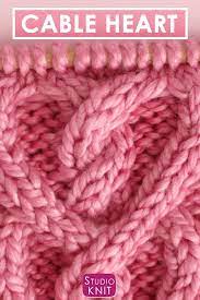 Using cable twist stitches, this unique knitting pattern creates interlocking columns of hearts. How To Knit A Cable Heart Free Knitting Pattern Video Video Video Knitted Heart Pattern Knit Stitch Patterns Cable Knitting