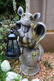 Drachenkind Auf Kugel Mit Solar Laterne Drache Figur Gargoyle Gartenfigur Amazon De Kuche Haushalt Drachen Kinder Drachenkunst Drachen