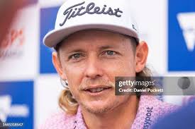 Cameron Smith of Australia poses for a photograph with young golfers...  News Photo