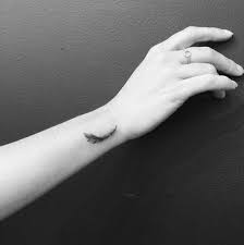 The wrist is the coolest area to get a tattoo. Wrist Tattoos For Women Ideas And Designs For Girls Tiny Wrist Tattoos White Feather Tattoos Feather Tattoo Wrist