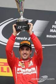 Premio principe de asturias campeón del mundo karting 🌎 campeón del mundo f1 🌎🌎 campeón del mundo resistencia 🌎 24h de le mans 🏆🏆 24h daytona 🏆 piloto. Fernando Alonso Ferrari Celebrates His Second Position On The Podium Ferrari Podium Formula 1