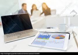 Stock Photo 21341875 Digital Tablet Showing Data Chart On Screen And Blank Screen Of