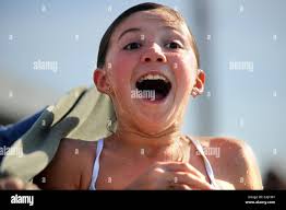 A shocked Katie Grabowski, 10, reacts to the cold water