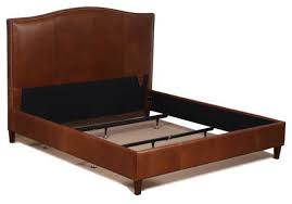 Featuring a geometric, button tuft, they are gently padded serving as the perfect amount of support should you choose to rest against it for reading or television viewing. Tobacco Brown Genuine Leather Bed With Brass Nail Heads Transitional Platform Beds By For Now Designs Houzz