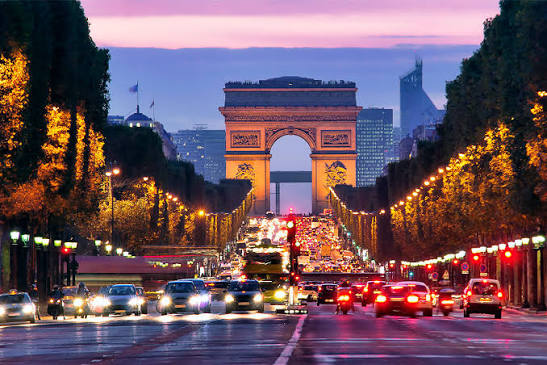 France Tourism view across historic Paris rooftops