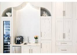 Maybe you would like to learn more about one of these? White Cypress Kitchen Pantry Cabinets With Marble Herringbone Tiles Cottage Kitchen