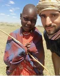 Image result for crown  prince of dubai with african children