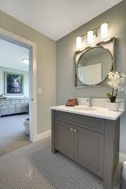 I always start with the stone when designing a bathroom, and that begins to inform the color palette. A Lot Of Experts Recommend Grey Colors For The Walls Floors And Furniture Of The Bat Grey Bathroom Cabinets Painting Bathroom Cabinets Bathroom Color Schemes