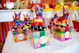 A pretty flower arrangement really livens up the party decor. Kara S Party Ideas Mexican Fiesta Themed Family Adult Birthday Party Planning Ideas