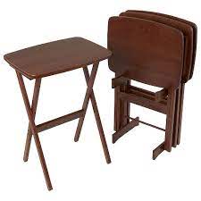 They're handy for setting the table, breakfasts in bed or for when you want tea and biscuits while you read a book. Manchester Wood Contour Folding Tv Tray Table Set Of 4 Chestnut Buy Online In United Arab Emirates At Desertcart Ae Productid 9027137