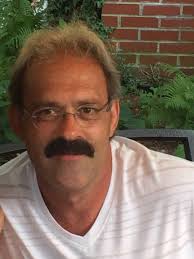 Is the cannon and granite boulder outside the Aurora Memorial Library still  there and what is its history?