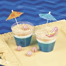 The grey layer has a secret ingredient that makes these taste beyond amazing! Beach Scene Dirt Cups Recipe Fun365