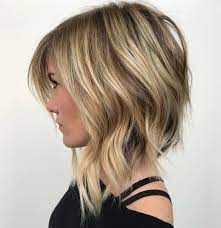 50 Medium Haircuts For Women That Ll Be Huge In 2021 Hair Adviser Long Angled Bob Hairstyles Angled Bob Haircuts Angled Bob Hairstyles