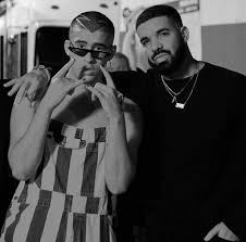 Mine) is a song by puerto rican singer bad bunny featuring vocals from canadian rapper drake. Bad Bunny Ft Drake Mia Musica Urbana Amino