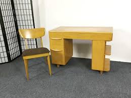 The desk ships flat to your door and minimal assembly is required by simply attaching. Heywood Wakefield Mid Century Desk And Chair Dangerfield Auctions Llc