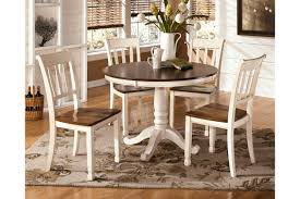 Adorable amelia aims to establish a farmhouse ambiance in the traditionally styled home. Whitesburg Dining Table And 4 Chairs Set Ashley Furniture Homestore