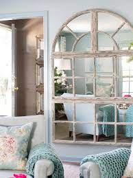 Mirrors add light to a room, while clever posters and artworks can create an illusion of a larger room. 13 Ways To Make A Small Living Room Look Bigger Small Living Rooms Small Living Room Design Small Living Room
