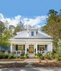 Please feel free to reach out to us for an exterior color your house package! 250 White House Silver Metal Roof Black Shutters Ideas House Black Shutters Metal Roof
