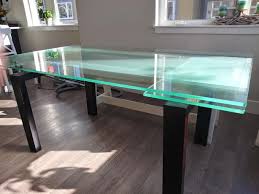 Extendable tables are also a smart way to account for potential guests, but take up less space when you aren't using the full length of the table. Stunning Modern Glass Dining Table Euc Classifieds For Jobs Rentals Cars Furniture And Free Stuff