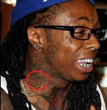 In some cases, these tats are so uncomfortable and joker tattoo: Lil Wayne S 86 Tattoos Their Meanings Body Art Guru