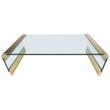 Are glass coffee tables good? Modern Glass And Brass Waterfall Coffee Table For Sale At 1stdibs